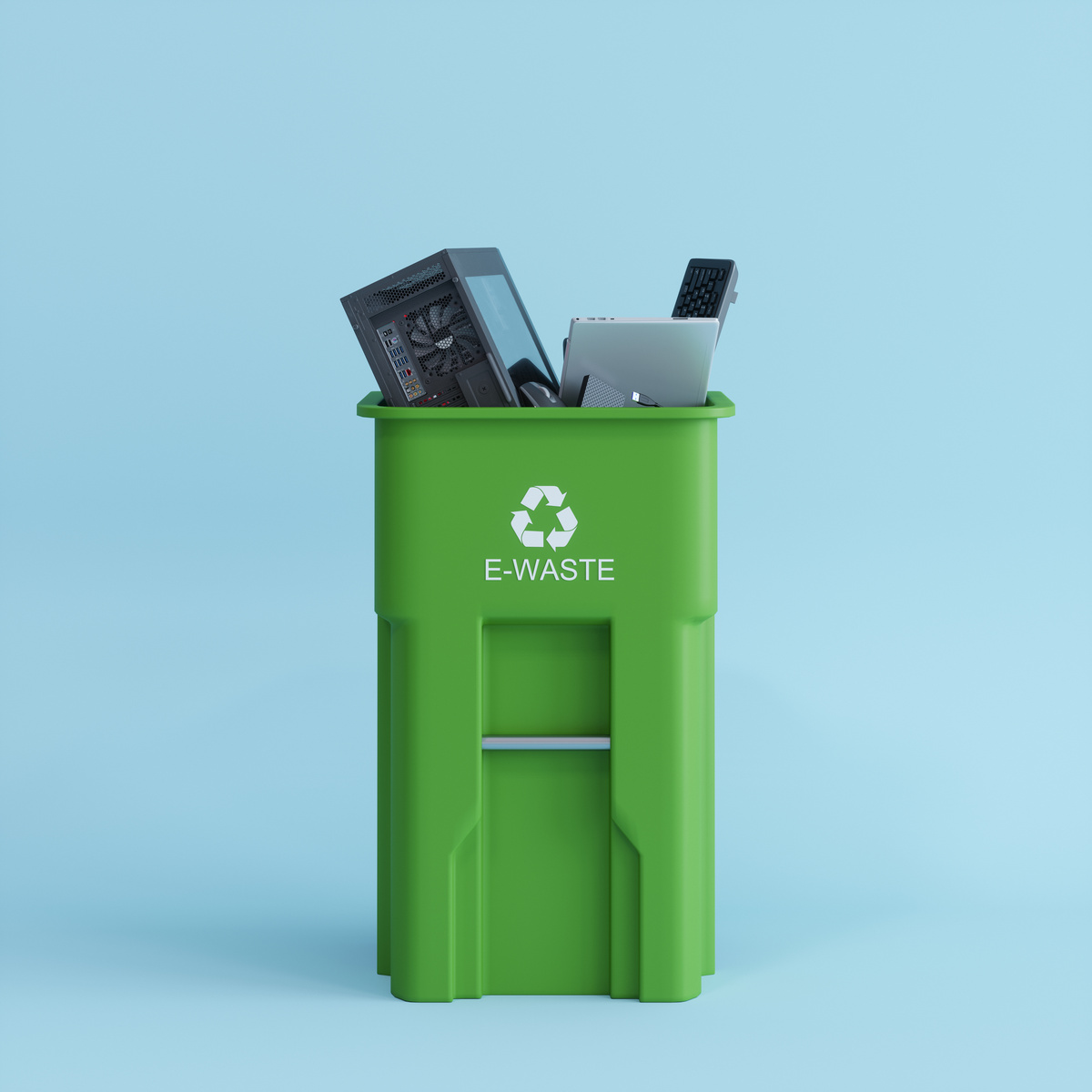 Electronic Wastes Collected In The Green Colored Garbage Bin With E-waste Symbol. Environmental Conservation And Recycle Concept